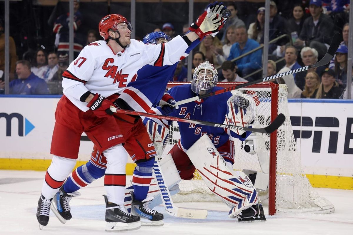 Rangers outlast Hurricanes in 2 OTs, take 2-0 series edge
