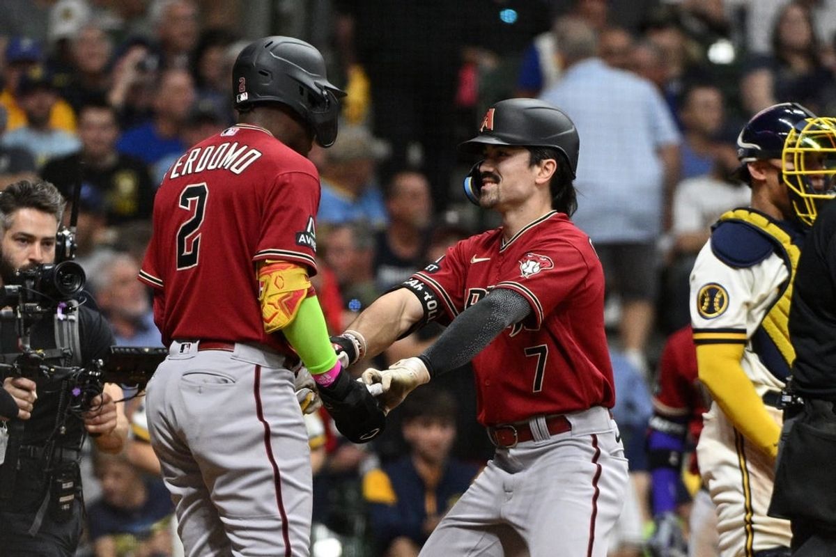 Early homers send D-backs to Game 1 win over Brewers